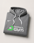 Sweat à capuche Nike Femme Domicil'Gym gris - produit plié